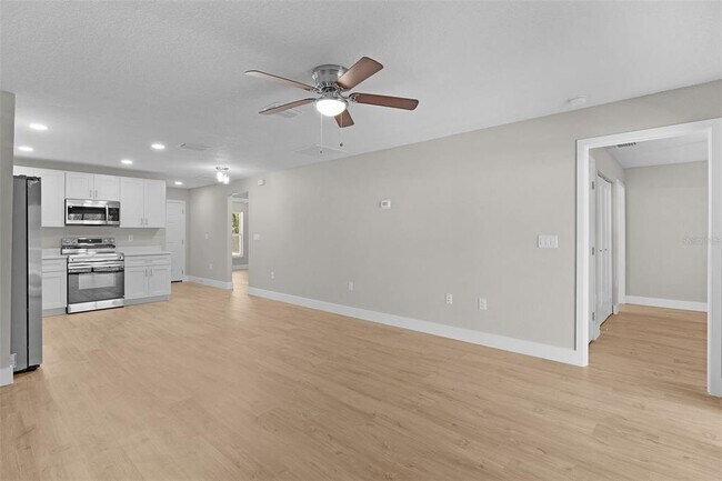 Building Photo - 9170 N Travis Dr