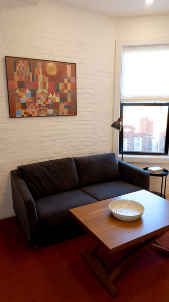 Building Photo - The Oyster: Furnished Apts, 30-Day+ Stay