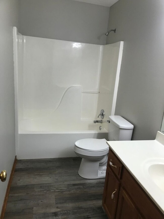 Building Photo - {1601} Spacious Duplex + Two Car Garage + Finished Basement + Fort Osage School District