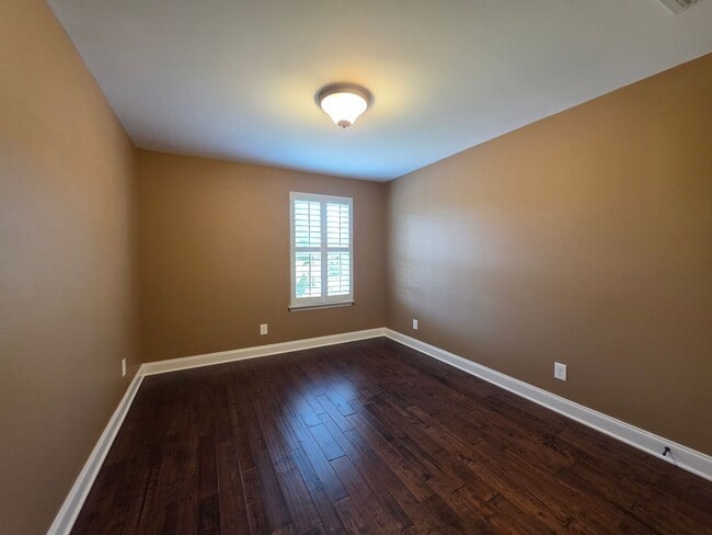Building Photo - For Lease  End-Unit 3-Bedroom Townhome wit...