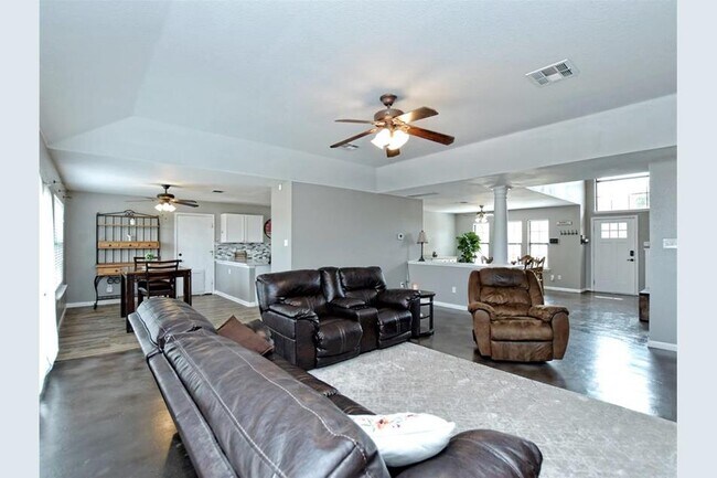 downstairs living area - 102 N Prairie Ln