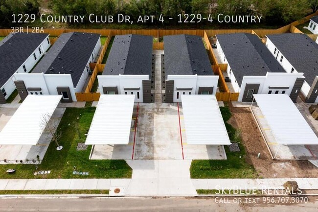 Building Photo - 1229 Country Club Dr