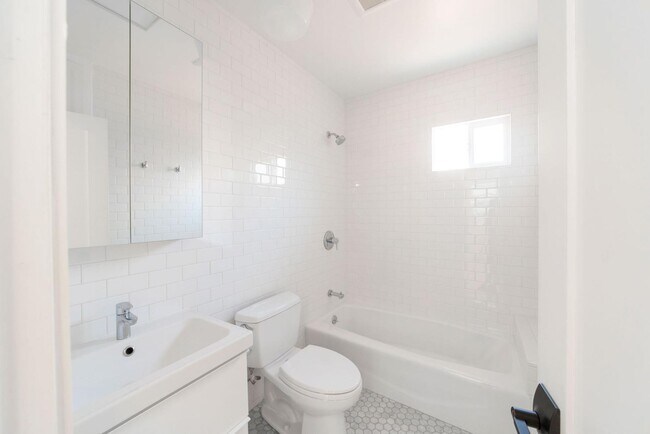 Building Photo - Spacious and Updated property in the heart...