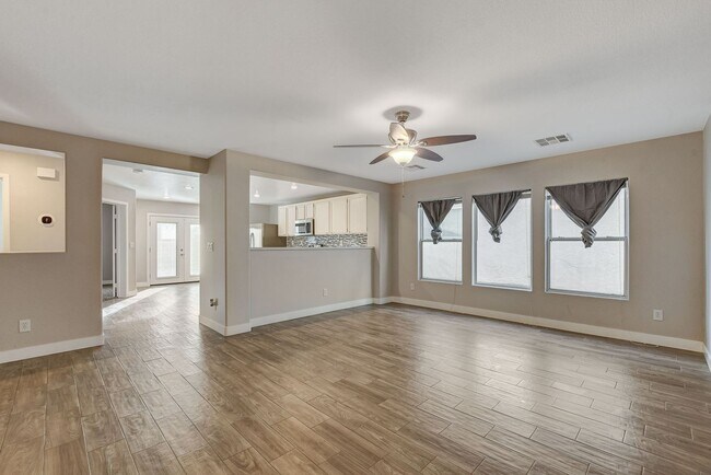 Building Photo - Totally Updated Solar Powered 4 Bedroom! Bedroom and Bath Downstairs!