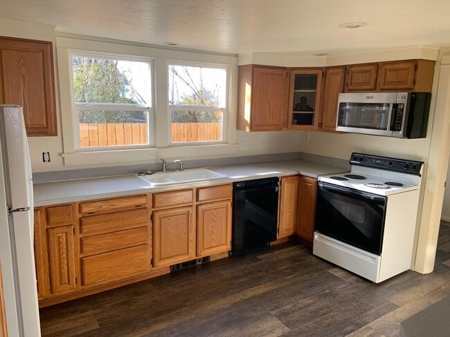 Building Photo - Great Updated House with a Fabulous Front Porch and Room to Garden