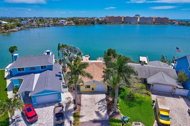 Building Photo - Waterfront 3BR/2BA Home – Walk to Beach + Boat Lift – $500 Off!