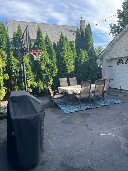Grill not included - table set & rug can stay if you’d like - 167 Harrison Ave