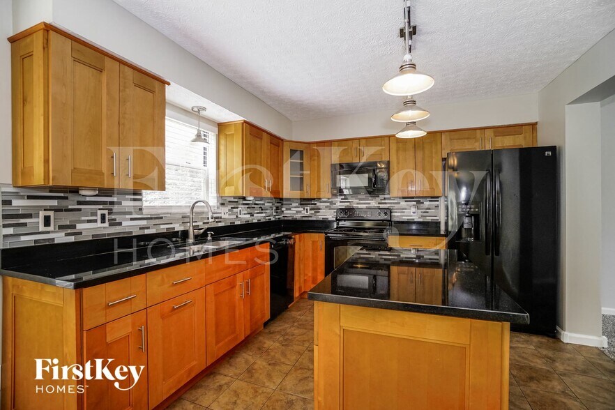 Building Photo - 5947 Heritage Farms Dr