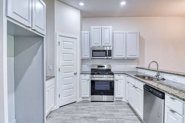 Building Photo - Brand New Construction! Lawn care provided!