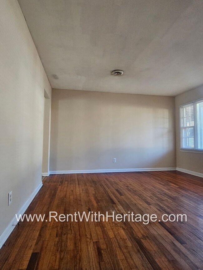 Building Photo - Great Brick Ranch / Harwood Floors / Huge Shop or Extra Storage / No Garage / Great Private Back ...