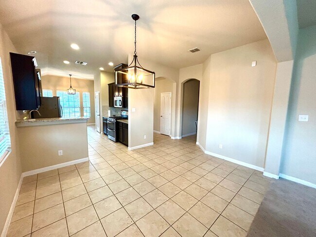 Building Photo - Modern Home with Fenced Backyard, Community Pool & Playground!