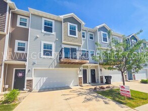 Building Photo - Summer rent special: $250 off the first two months rent! Modern Ankeny Townhome with Two Primary ...