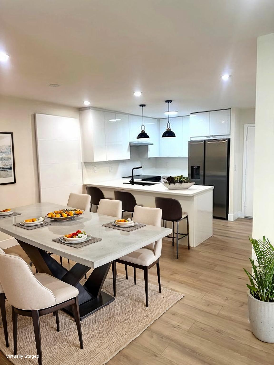 Kitchen and dining area virtually staged - 11645 Montana Ave