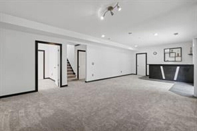 Building Photo - Spacious 5-Bed Walkout Home with Over 3,50...