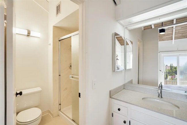 Building Photo - Spacious 1,550 Sq Ft Townhome | 2-Car Garage & High Ceilings w/ Exposed Beams