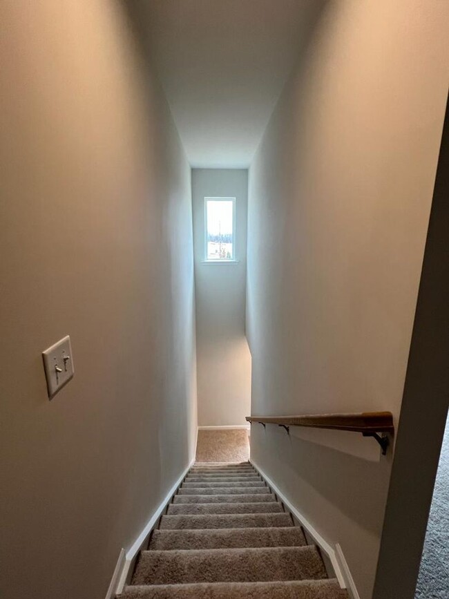 Building Photo - Townhome with 3BR/2.5BA Garage Located in ...