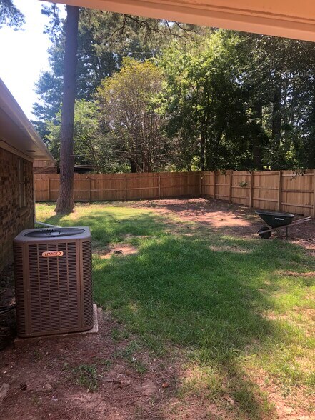 fenced in backyard - 100 Medina Dr