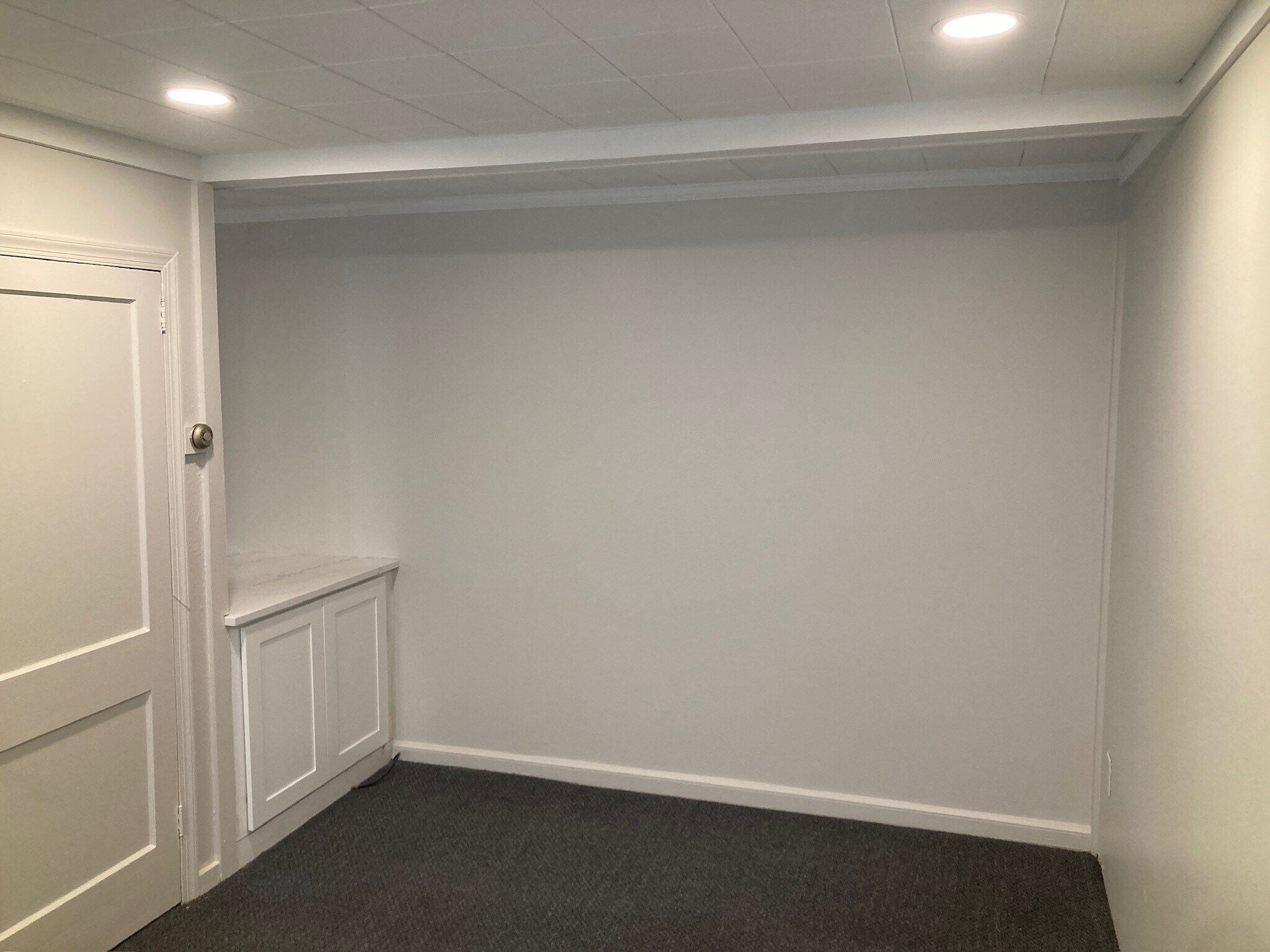 Living area with recessed lighting - 227 E Hector St