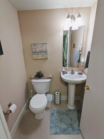 downstairs: half bath - 4751 NE Prescott St