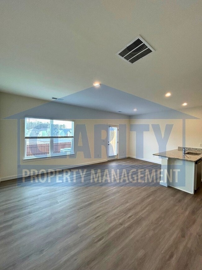 Building Photo - Newly built three bedroom townhome!