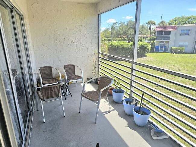 Building Photo - 7355 Woodmont Terrace