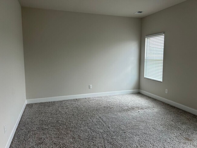 Building Photo - Three car garage Two story home close to e...