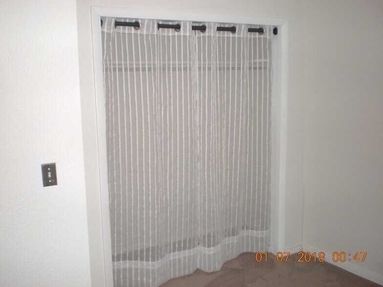 Double closet in larger lower level bedroom with new carpet and paint - 1160 Clinton St