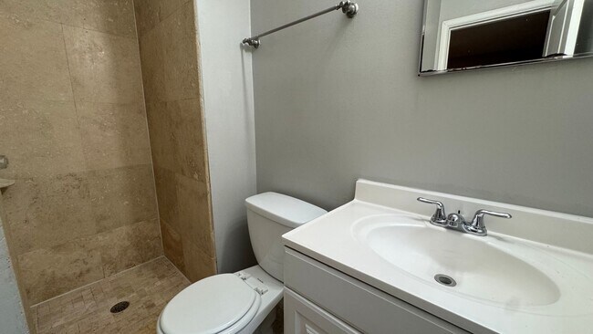 Building Photo - Spacious 5/2 for rent in Normandy Village ...