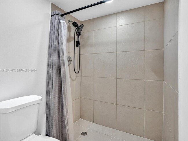 Building Photo - 3675 N Country Club Dr