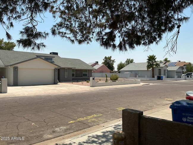 Building Photo - 8837 W Highland Ave