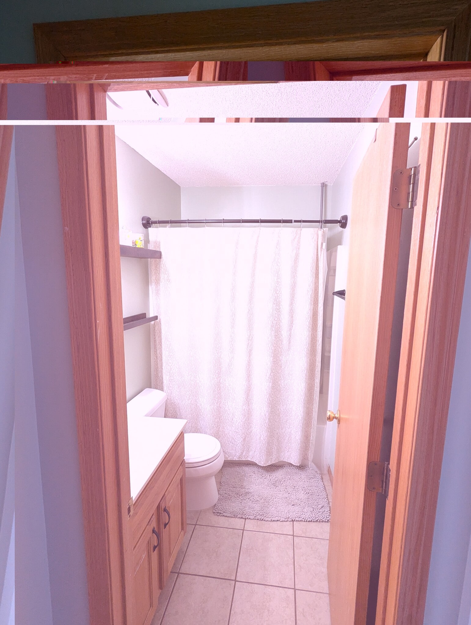 stair landing view of upstairs bathroom - 6186 S Pointe Dr SW