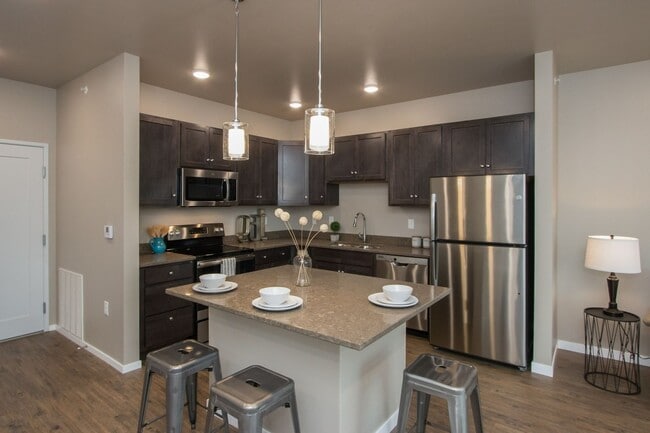 Building Photo - Spacious 1-bedroom, 1.5 bath, 1st floor, with elevated deck, available 07/01/2026