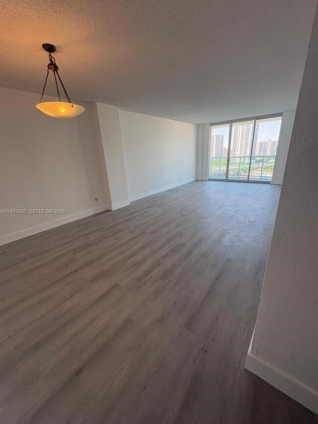 Building Photo - 19390 Collins Ave