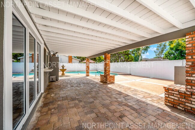 Building Photo - Brand New Remodel – Stunning Pool Home wit...