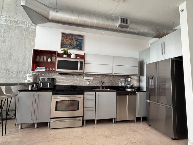 Building Photo - 690 SW 1st Ct