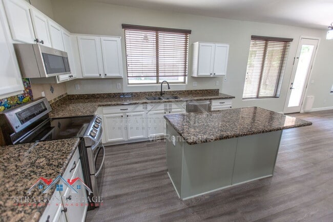 Building Photo - 14099 W Riviera Dr