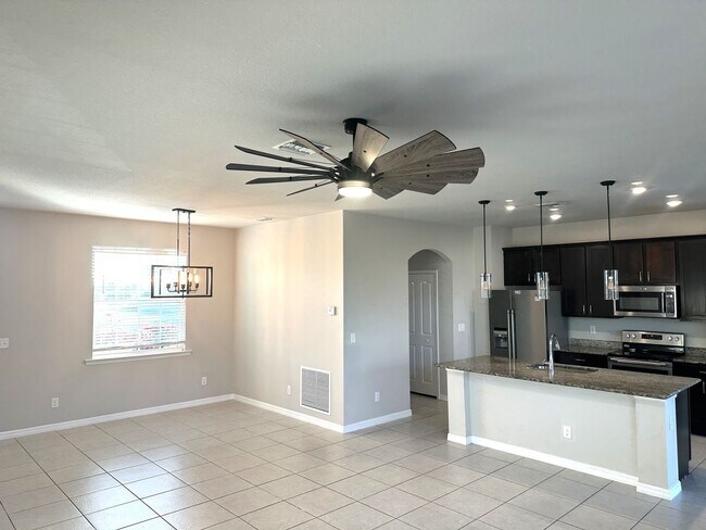 Building Photo - Available Mid April!! NW CAPE CORAL 3 BEDROOM 2 BATHROOM 2 CAR GARGAGE