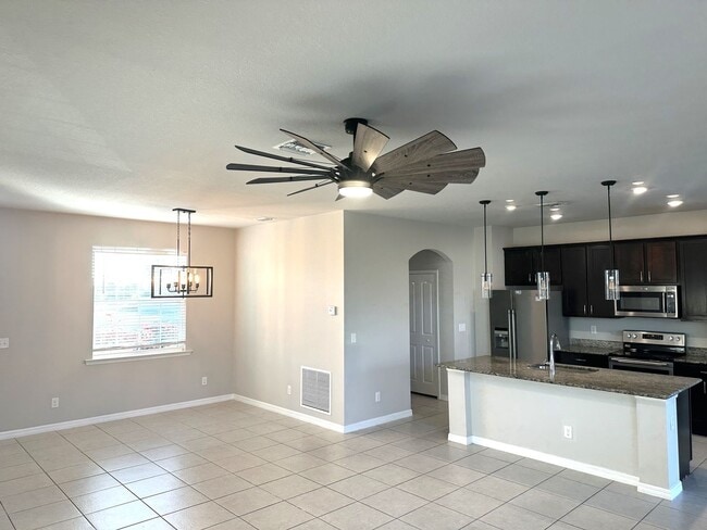 Building Photo - Available Now!! NW CAPE CORAL 3 BEDROOM 2 BATHROOM 2 CAR GARGAGE
