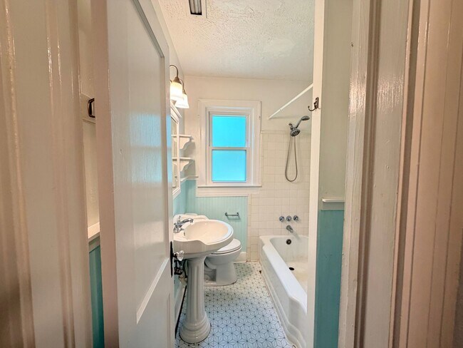 Building Photo - Historic Downtown Charm | Original Floors | Walk to Golf, Dining, Parks, & Concerts