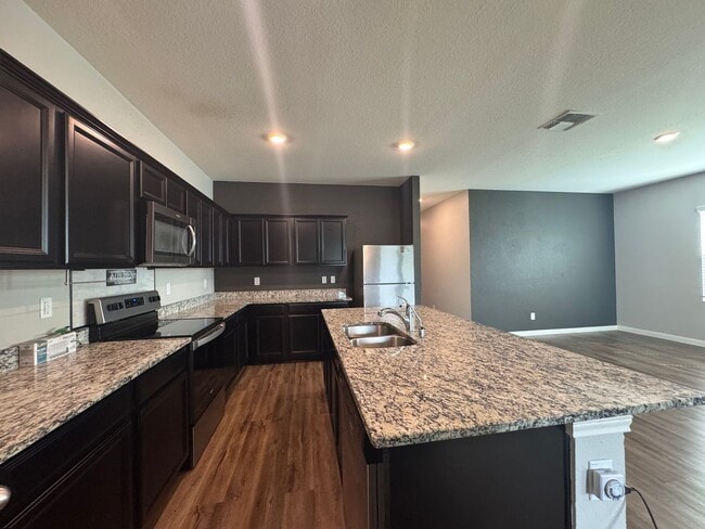 Building Photo - Spacious 4 Bedroom 3 Full Bath home in the Liberte Community!