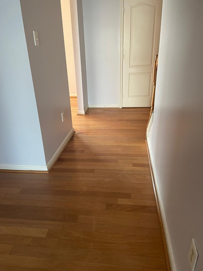 HALLWAY LEADING TO KITCHEN - 16304 Elkhorn Ln