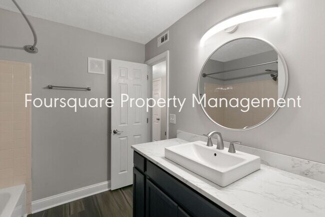 Building Photo - Charming 1st-Floor End-Unit Condo with Gas Log Fireplace, Private Back Porch & Community Pool – T...