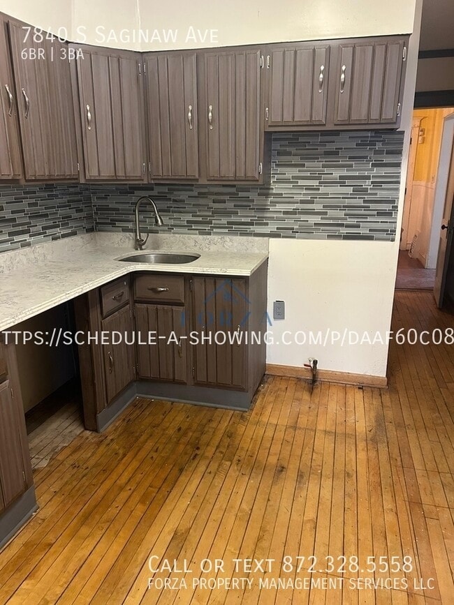 Building Photo - 7840 S Saginaw Ave