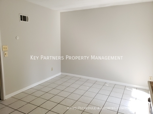 Building Photo - 7175 NW Chapel Woods Cir