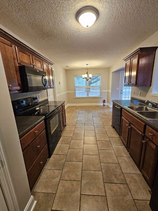 Building Photo - Home in Ludowici for rent with large fenced yard.