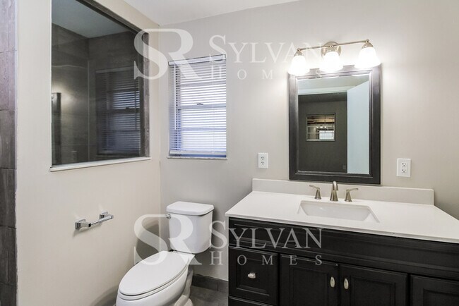 Building Photo - The ideal space to balance life, work, and play.