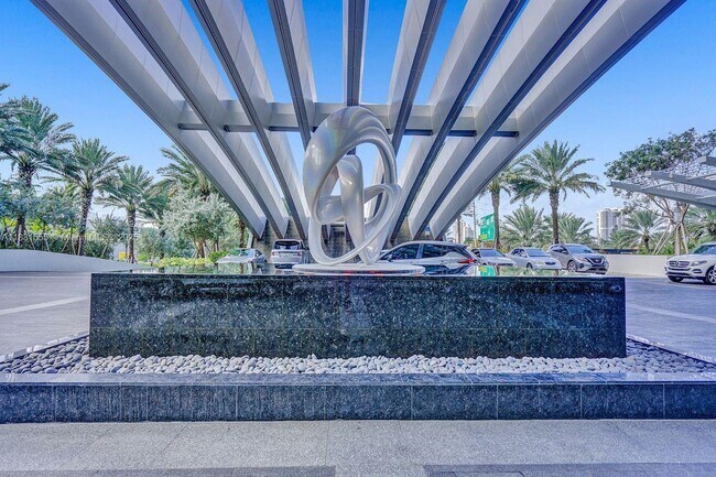 Building Photo - 18501 Collins Ave