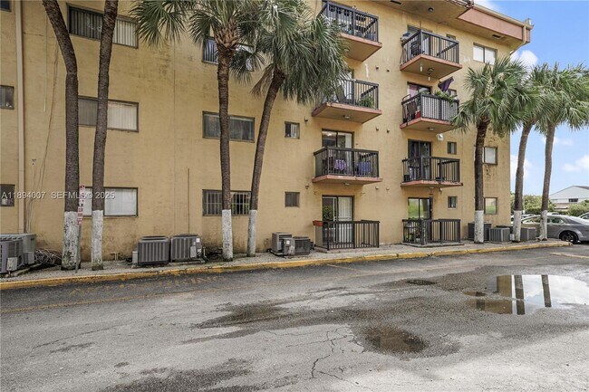 Building Photo - 5490 W 21st Ct