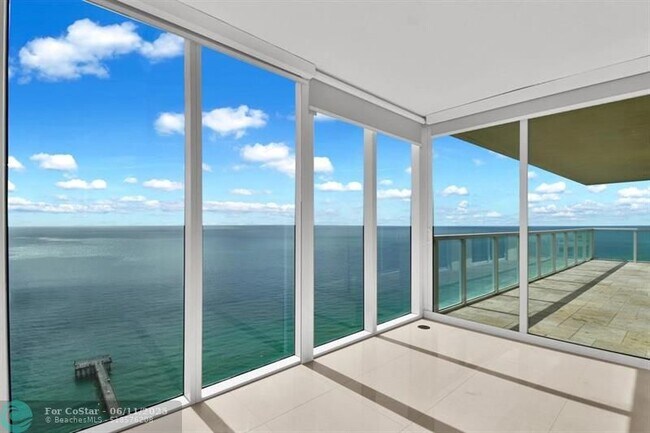 Building Photo - 16699 Collins Ave