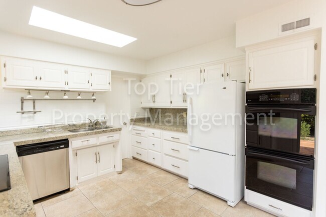 Building Photo - Charming Mid-Century Home | 4BR, 3BA | 2,4...
